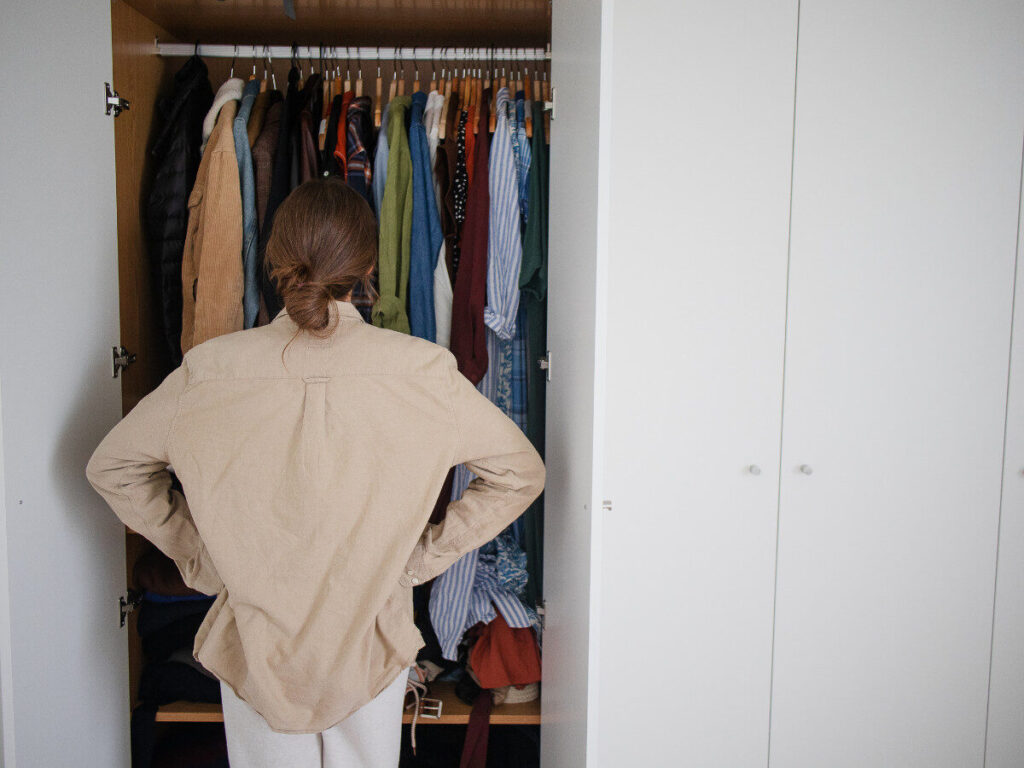 woman_looking_into_closet